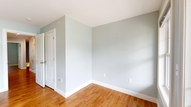 5 Callaway Dr Unit 2, Concord, NH 03301 - empty room featuring light wood finished floors, baseboards, and a smoke detector