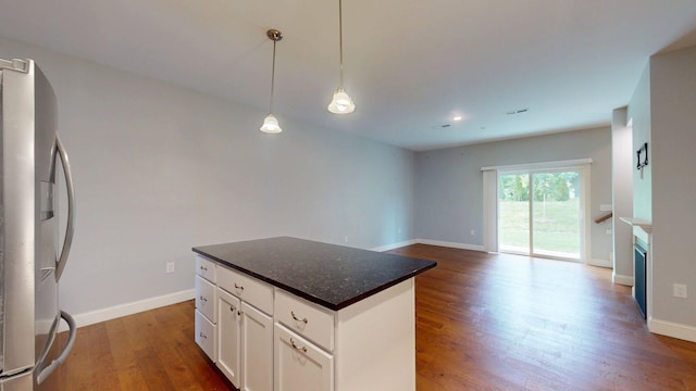 5 Callaway Dr Unit 2, Concord, NH 03301 - kitchen with freestanding refrigerator, a center island, wood finished floors, white cabinets, and decorative light fixtures