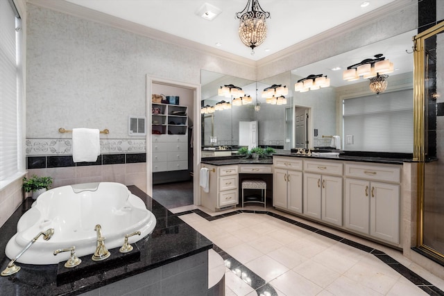 64 Sterling Pl, Bow, NH 03304 - full bathroom with vanity, ornamental molding, inlaid floor details, a whirlpool tub, and wallpapered walls