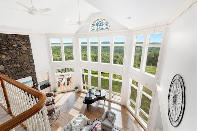 64 Sterling Pl, Bow, NH 03304 - living room featuring high vaulted ceiling, a ceiling fan, and light wood-style flooring