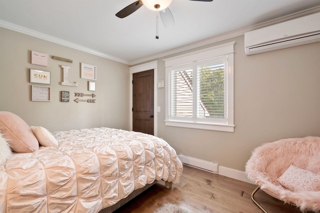 60 Weirs Rd Unit H1, Gilford, NH 03249 - bedroom with a wall mounted AC, baseboard heating, ornamental molding, wood finished floors, and baseboards