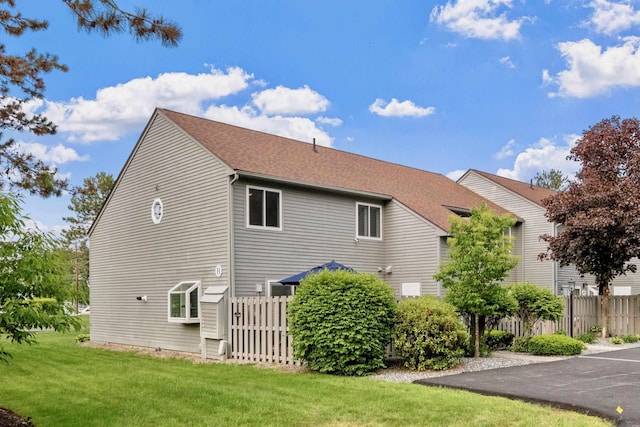 60 Weirs Rd Unit H1, Gilford, NH 03249 - view of side of property with roof with shingles