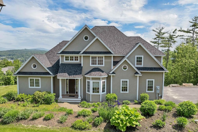 4 Mountain Ridge Dr, Meredith, NH 03253 - view of front of house with a shingled roof