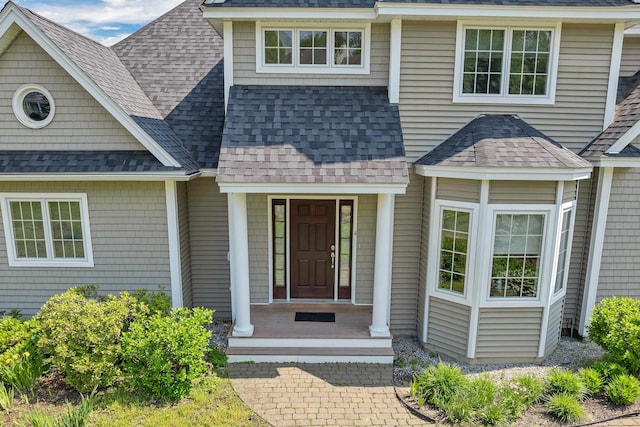 4 Mountain Ridge Dr, Meredith, NH 03253 - property entrance with a shingled roof