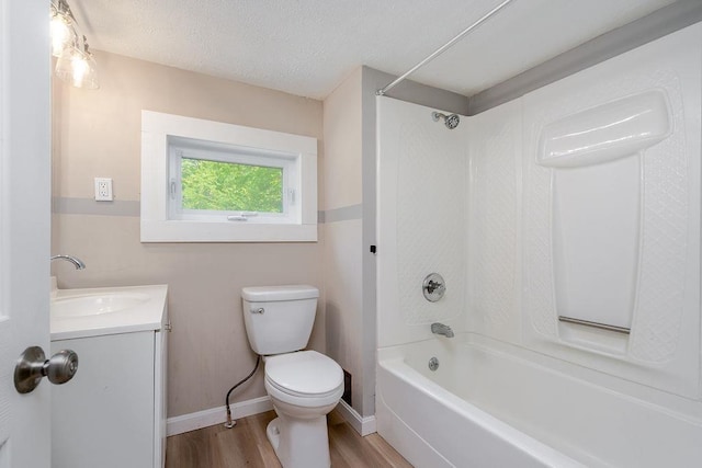 99 Stage Rd, Nottingham, NH 03290 - full bathroom with toilet, wood finished floors, shower / bathtub combination, vanity, and baseboards