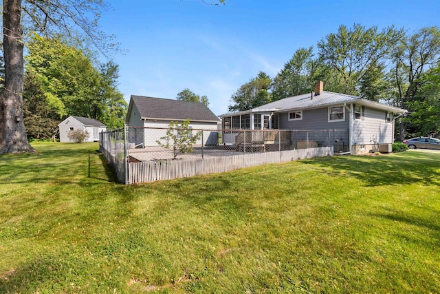 45 Cohas Ave, Manchester, NH 03109 - back of property featuring a chimney, metal roof, a sunroom, and central air condition unit