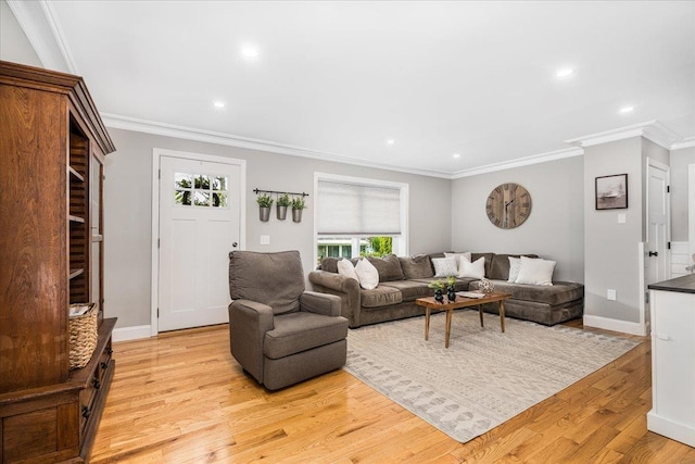 85 Lee Ave, Manchester, NH 03109 - living area featuring plenty of natural light, crown molding, light wood-type flooring, recessed lighting, and baseboards