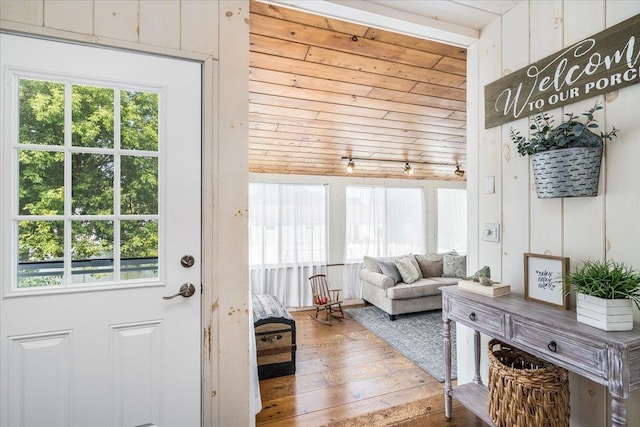 85 Lee Ave, Manchester, NH 03109 - entryway with healthy amount of natural light and hardwood / wood-style floors