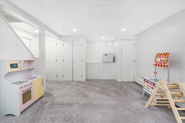 85 Lee Ave, Manchester, NH 03109 - playroom with light carpet, a sink, a drop ceiling, recessed lighting, and a baseboard heating unit