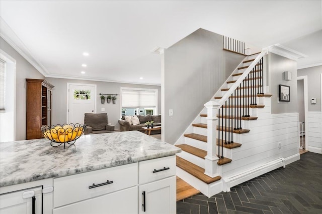 85 Lee Ave, Manchester, NH 03109 - stairs with crown molding, recessed lighting, and brick patterned flooring