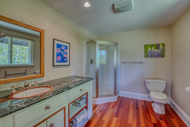394 Sunset Hill Rd, Sugar Hill, NH 03586 - bathroom with baseboards, a stall shower, toilet, and vanity