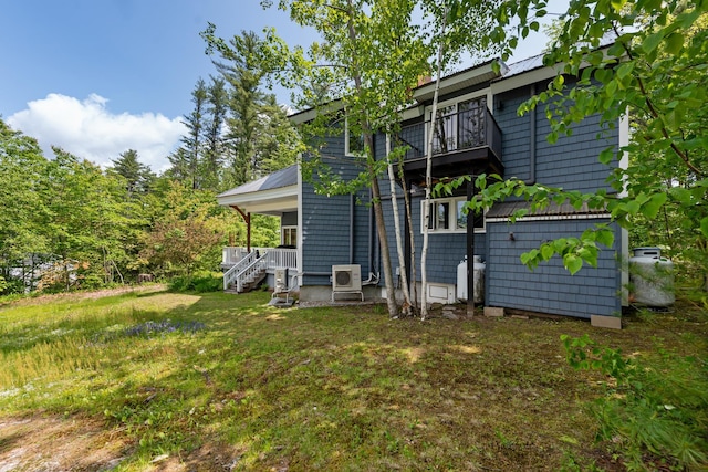 110 Heights Rd, Gilford, NH 03249 - back of house with a cooling unit, a balcony, and metal roof