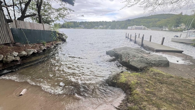 110 Heights Rd, Gilford, NH 03249 - dock with a water view and a wooded view