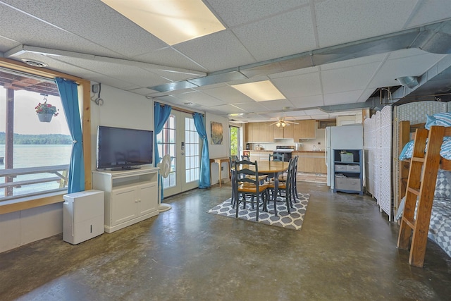 321 Webster Lake Rd, Franklin, NH 03235 - dining room with concrete flooring and a drop ceiling