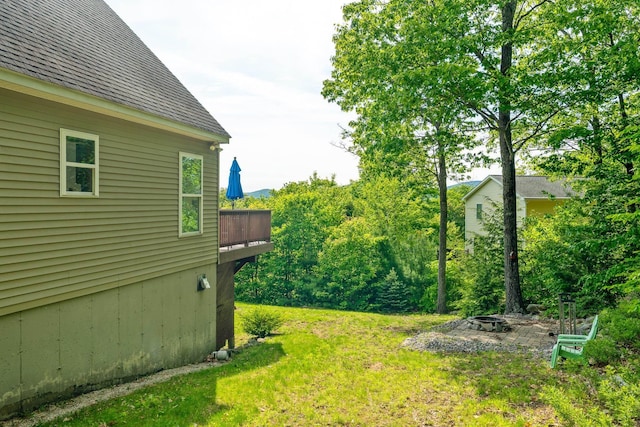 19 Wendy Dr, Alton, NH 03810 - view of green lawn with a fire pit
