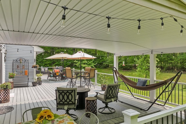 52 Meadow Ln, Belmont, NH 03220 - deck with outdoor dining space and a yard
