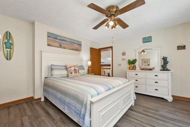 52 Meadow Ln, Belmont, NH 03220 - bedroom with dark wood-type flooring, baseboards, and a ceiling fan