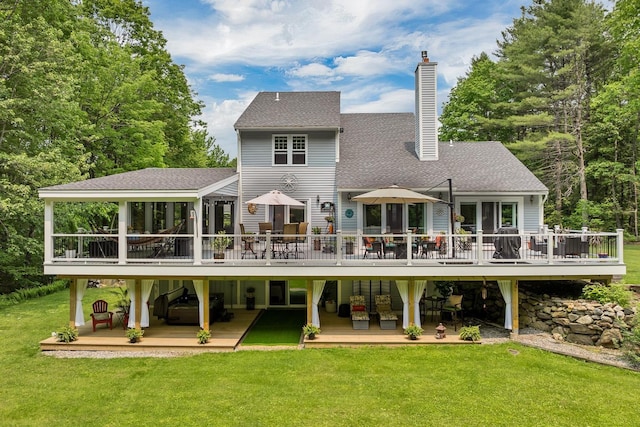 52 Meadow Ln, Belmont, NH 03220 - back of house with a wooden deck, a chimney, a yard, and a shingled roof
