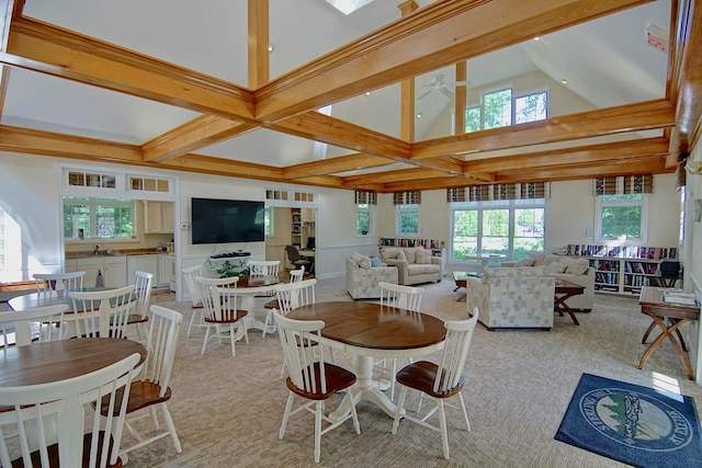 3 Sterling Hill Ln Unit 324, Exeter, NH 03833 - dining room featuring beamed ceiling, a high ceiling, and light carpet