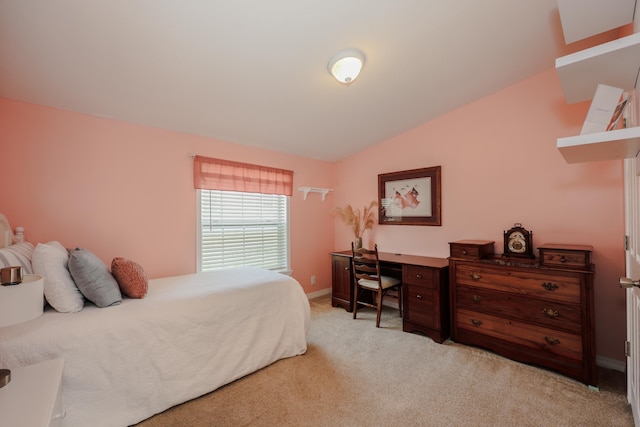 21 Mountain View Dr Unit 21, Franklin, NH 03235 - bedroom with light carpet, vaulted ceiling, a desk, and baseboards