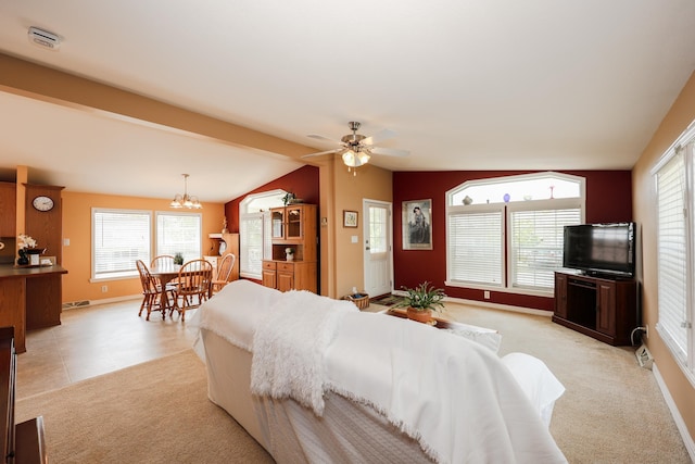 21 Mountain View Dr Unit 21, Franklin, NH 03235 - living area with lofted ceiling, ceiling fan, a chandelier, baseboards, and light colored carpet