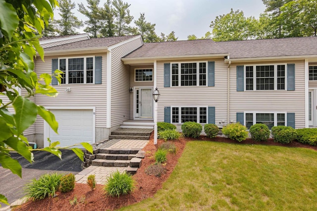 15 Christopher Dr Unit 5, Sandown, NH 03873 - split foyer home featuring an attached garage and a front lawn
