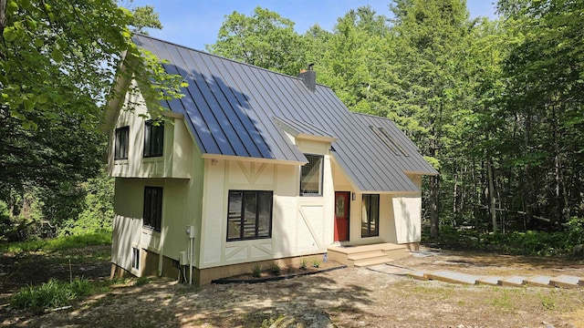 209 Craney Hill Rd, Henniker, NH 03242 - view of front of property with a standing seam roof, metal roof, and a chimney