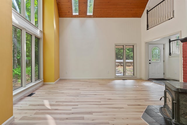 209 Craney Hill Rd, Henniker, NH 03242 - entrance foyer with high vaulted ceiling, wood finished floors, wood ceiling, and baseboards