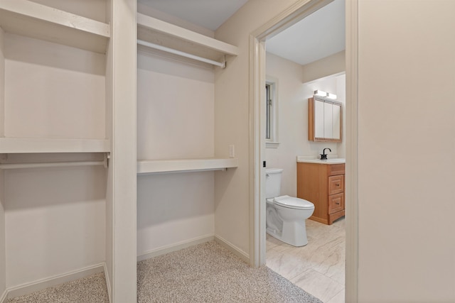 209 Craney Hill Rd, Henniker, NH 03242 - bathroom with toilet, vanity, and baseboards