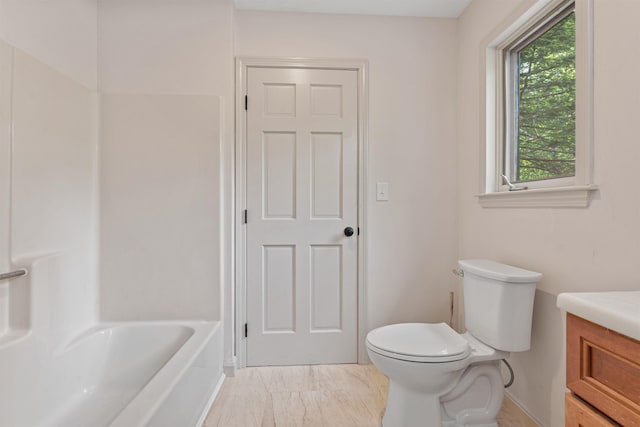 209 Craney Hill Rd, Henniker, NH 03242 - bathroom featuring vanity, toilet, marble finish flooring, and baseboards