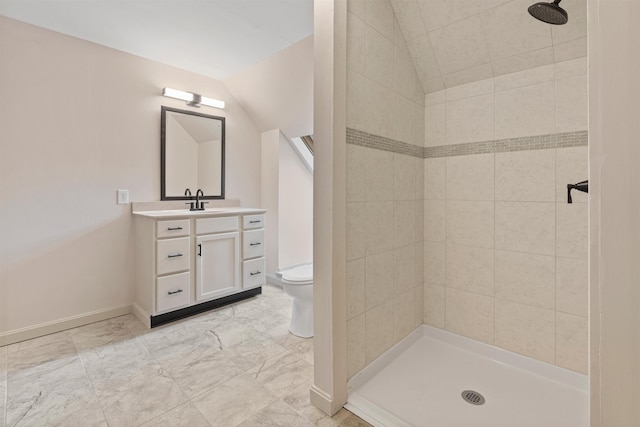 209 Craney Hill Rd, Henniker, NH 03242 - full bath featuring a tile shower, toilet, vaulted ceiling, vanity, and baseboards