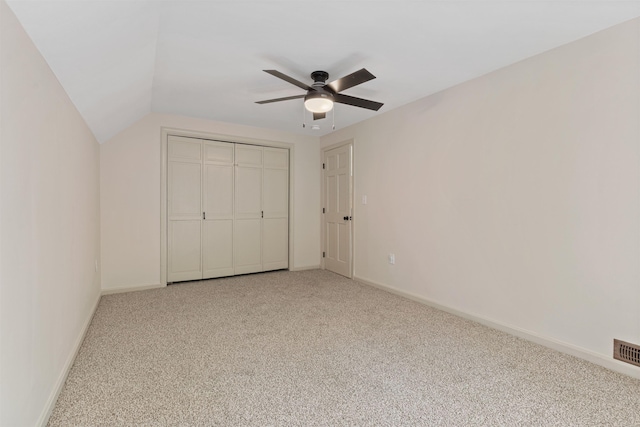 209 Craney Hill Rd, Henniker, NH 03242 - unfurnished bedroom featuring carpet floors, baseboards, lofted ceiling, a closet, and a ceiling fan