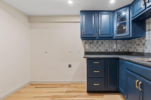 209 Craney Hill Rd, Henniker, NH 03242 - kitchen featuring blue cabinetry, dark countertops, light wood finished floors, and recessed lighting