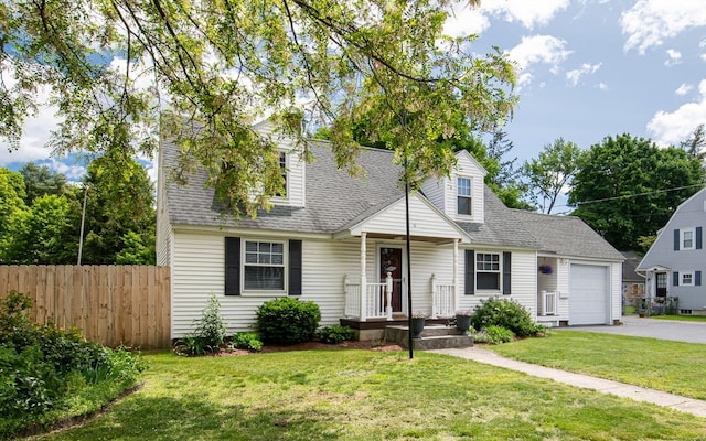 2 E Dunstable Rd, Nashua, NH 03060 - cape cod home featuring asphalt driveway, an attached garage, and a shingled roof