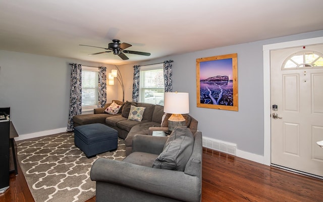 2 E Dunstable Rd, Nashua, NH 03060 - living area featuring baseboards, ceiling fan, and dark wood-style flooring