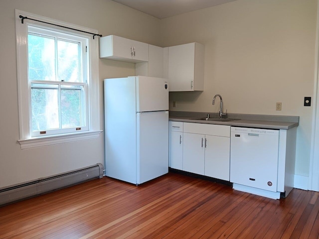 406 Dalton Dr Unit D, Colchester, VT 05446 - kitchen featuring white appliances, a sink, a baseboard radiator, wood finished floors, and healthy amount of natural light