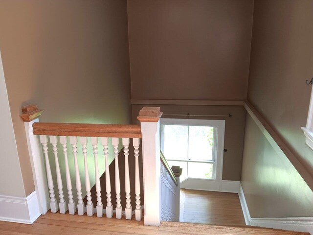 406 Dalton Dr Unit D, Colchester, VT 05446 - stairway featuring wood finished floors and baseboards
