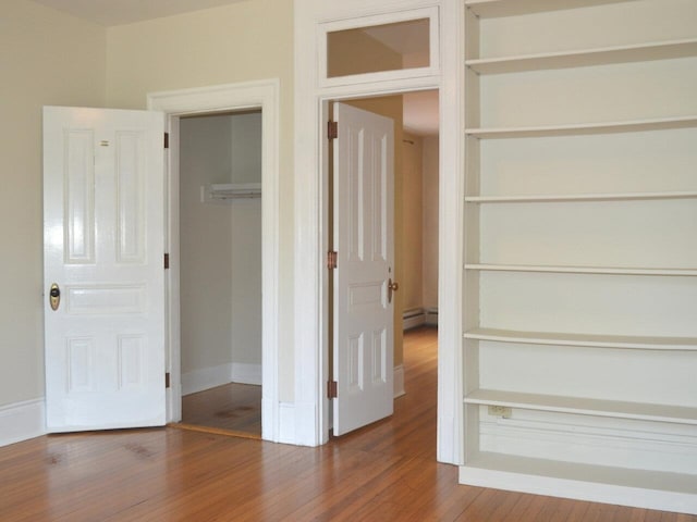 406 Dalton Dr Unit D, Colchester, VT 05446 - closet with baseboard heating