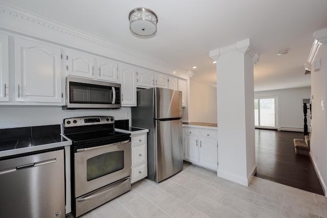4 Kimberly Dr Unit 4, Merrimack, NH 03054 - kitchen with appliances with stainless steel finishes, white cabinets, baseboards, recessed lighting, and ornamental molding