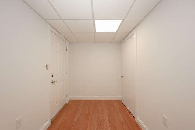 4 Kimberly Dr Unit 4, Merrimack, NH 03054 - empty room with a paneled ceiling, light wood-style flooring, and baseboards