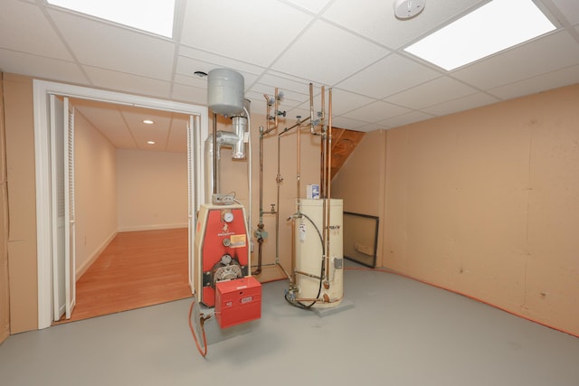 4 Kimberly Dr Unit 4, Merrimack, NH 03054 - finished below grade area featuring gas water heater and a paneled ceiling
