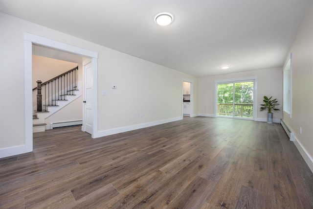80 Scott Dr, Alton, NH 03810 - unfurnished living room featuring a baseboard radiator, stairs, dark wood finished floors, and baseboards