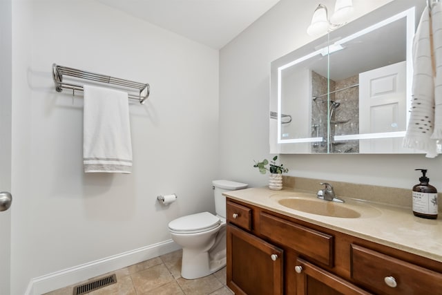 67 Leddy Dr, Epping, NH 03042 - full bath with vanity, a shower, toilet, baseboards, and tile patterned flooring