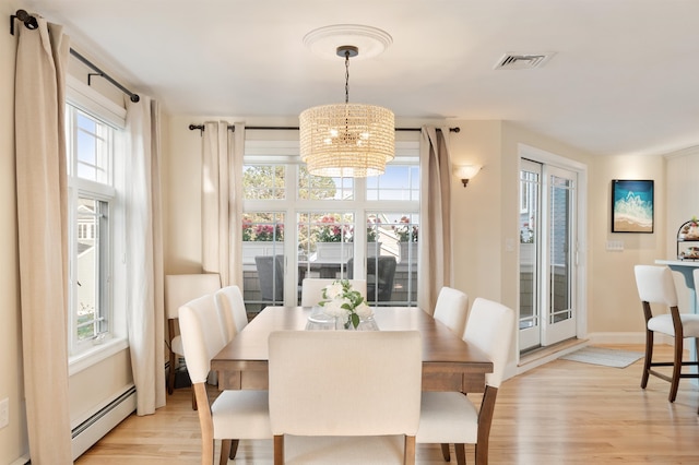 30 Ancient Hwy, Hampton, NH 03842 - dining room with a chandelier, light wood-style floors, healthy amount of natural light, and baseboards