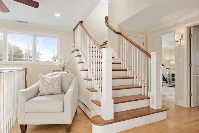 30 Ancient Hwy, Hampton, NH 03842 - stairs featuring baseboard heating, a ceiling fan, wood finished floors, recessed lighting, and ornamental molding