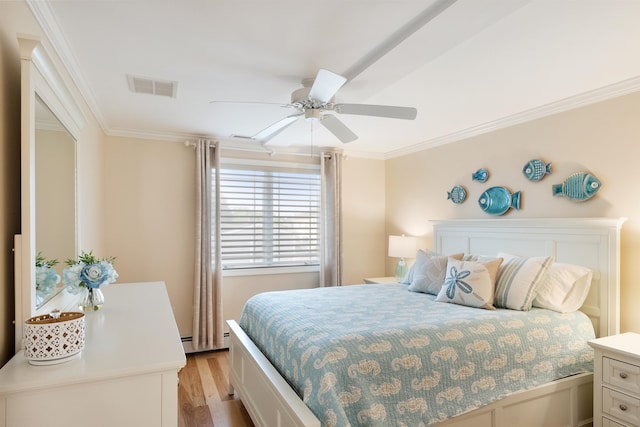 30 Ancient Hwy, Hampton, NH 03842 - bedroom featuring ornamental molding, light wood-type flooring, and a ceiling fan