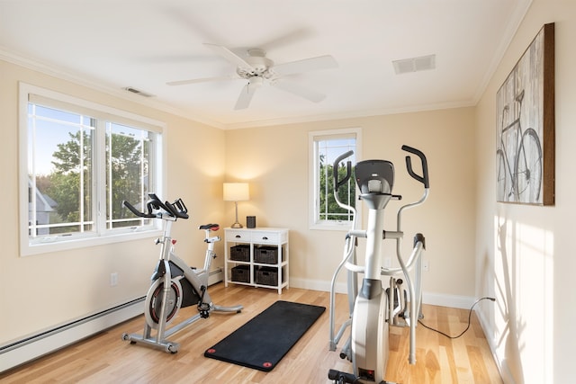 30 Ancient Hwy, Hampton, NH 03842 - exercise area with wood finished floors, crown molding, baseboards, a ceiling fan, and a baseboard heating unit