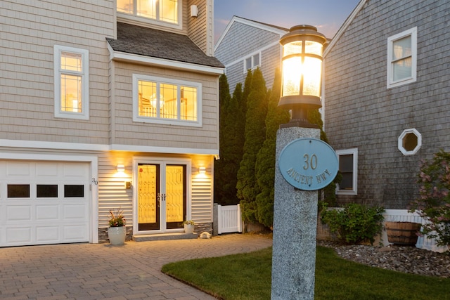 30 Ancient Hwy, Hampton, NH 03842 - view of front of house featuring decorative driveway and an attached garage