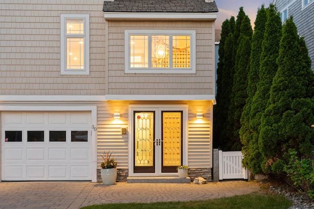 30 Ancient Hwy, Hampton, NH 03842 - view of front facade with a garage and decorative driveway