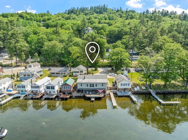 57 Lakeside Rd, Bristol, NH 03222 - aerial perspective of suburban area with a nearby body of water